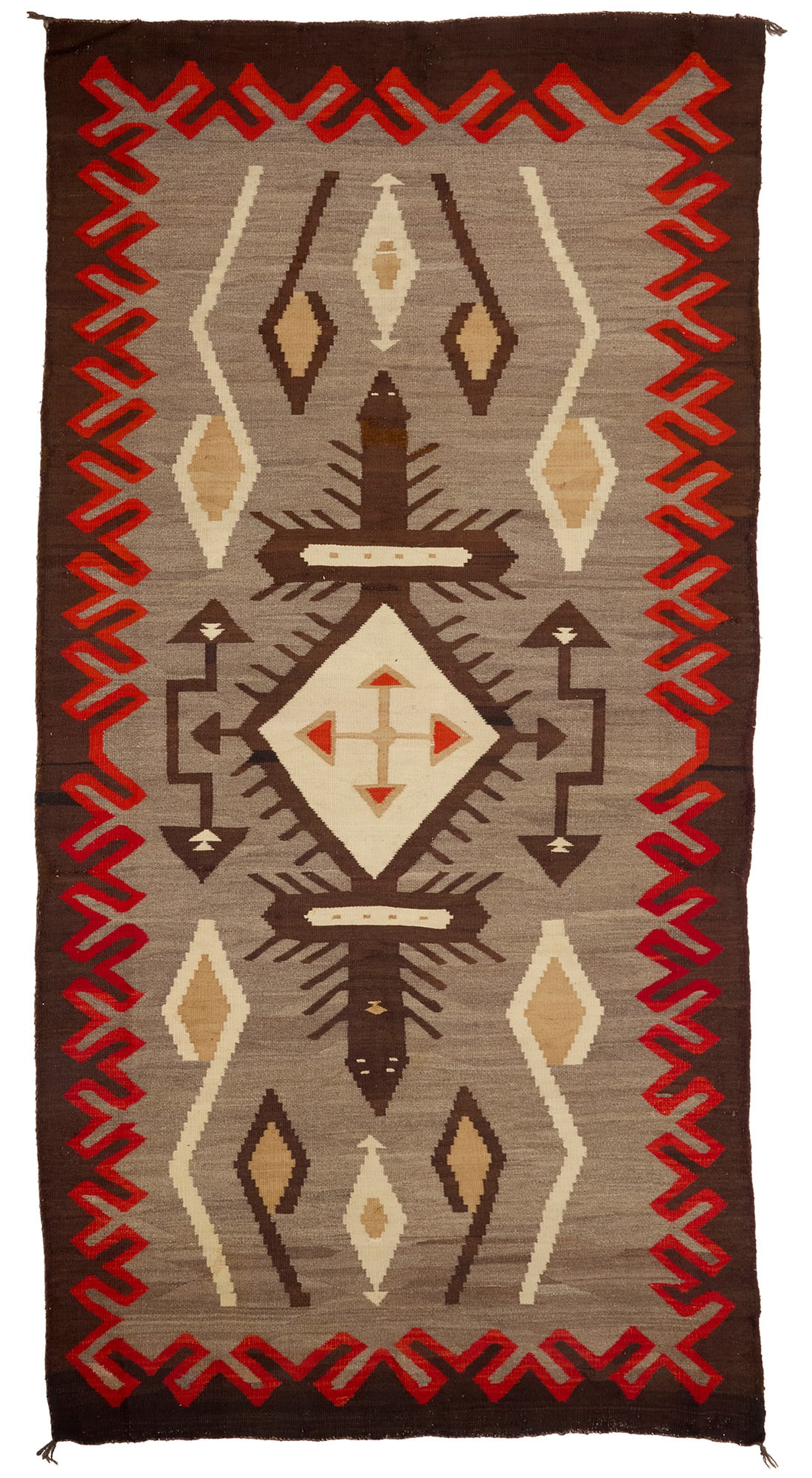 A Navajo JB Moore Crystal rug Early 20th century, Dine Woven in red, cream, ochre, dark brown, and (1 of 3)