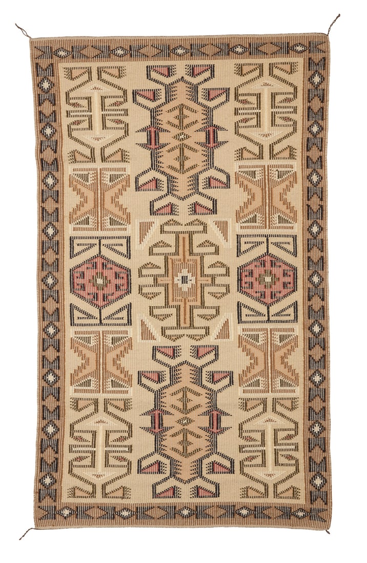 A Navajo Coal Mine Mesa raised outline rug: A Navajo Coal Mine Mesa raised outline rugLate 20th century, Dine, attributed to Evelyn YazzieWoven in a raised outline style in pale brown, red, grey, yellow, cream, and black wool depicting multiple
