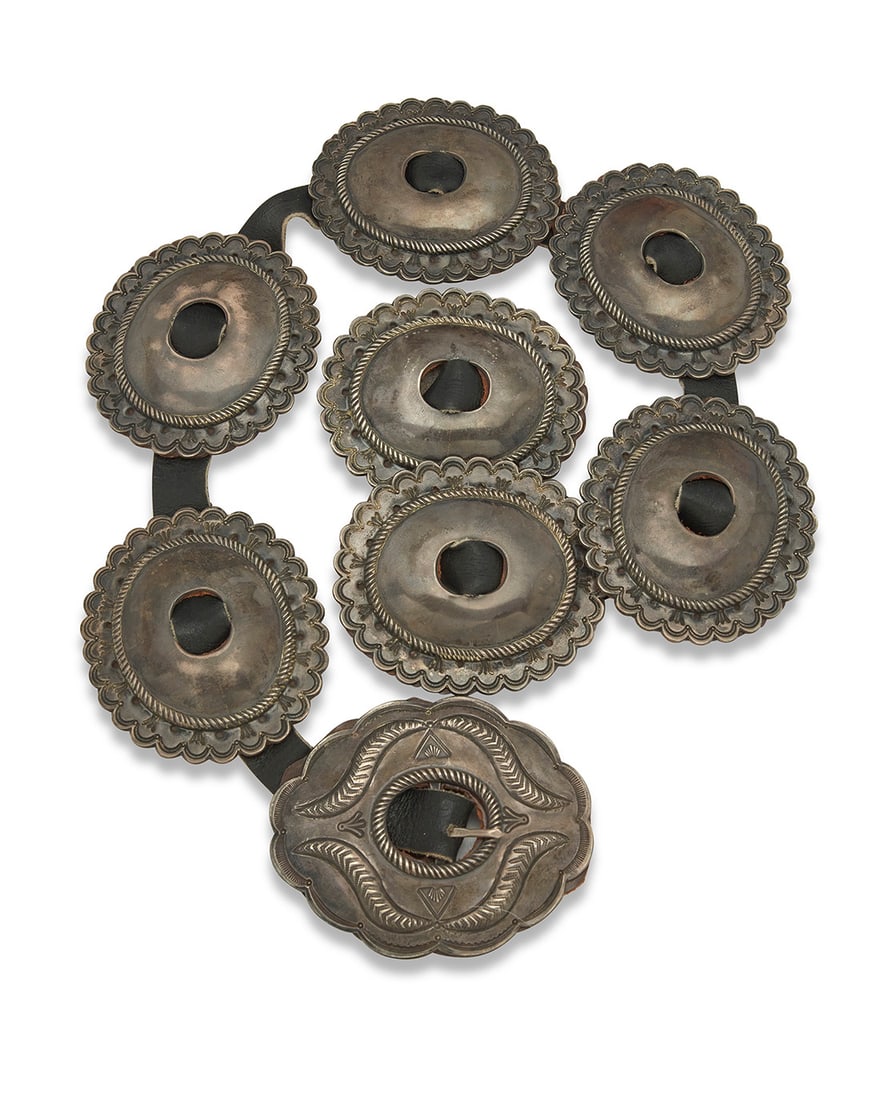 A Navajo First Phase style sterling silver concho belt Early 20th century, Dine Unmarked A chunky (1 of 4)