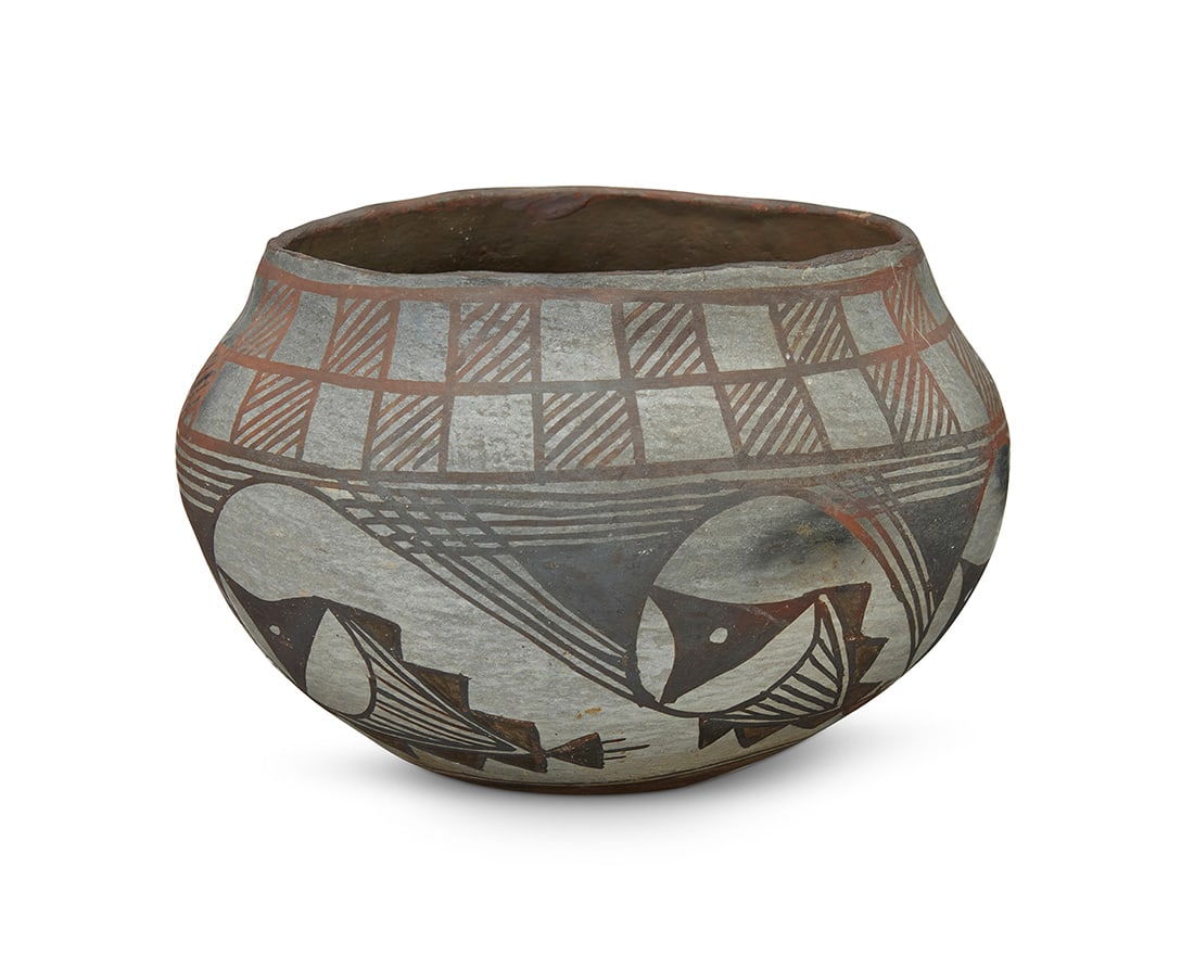 An Acoma Pueblo polychrome pottery jar Early 20th century Marked in slip paint to underside: (1 of 4)