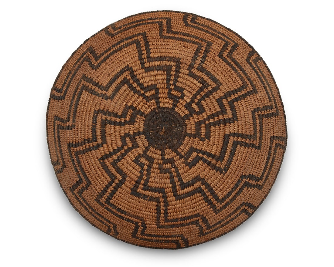 An Apache basketry tray Early 20th century; Southwest United States A coiled small low bowl with (1 of 6)