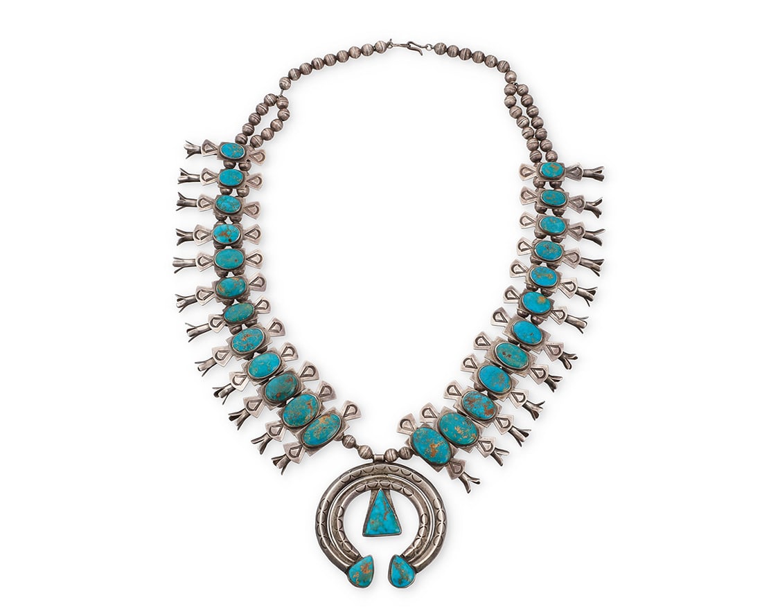 A Southwest 'Box and Bow' silver and turquoise squash blossom necklace Early/mid-20th century (1 of 3)