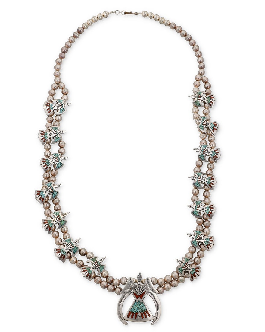 A Charlie Singer Navajo silver 'Peyote Bird' squash blossom necklace Charlie Singer (1931-2018, (1 of 3)