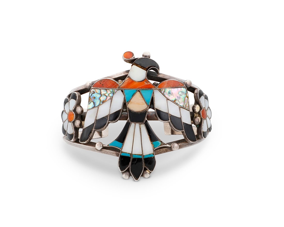 A Zuni Pueblo style sterling silver and stone inlay 'Thunderbird' cuff bracelet Mid-20th century (1 of 3)
