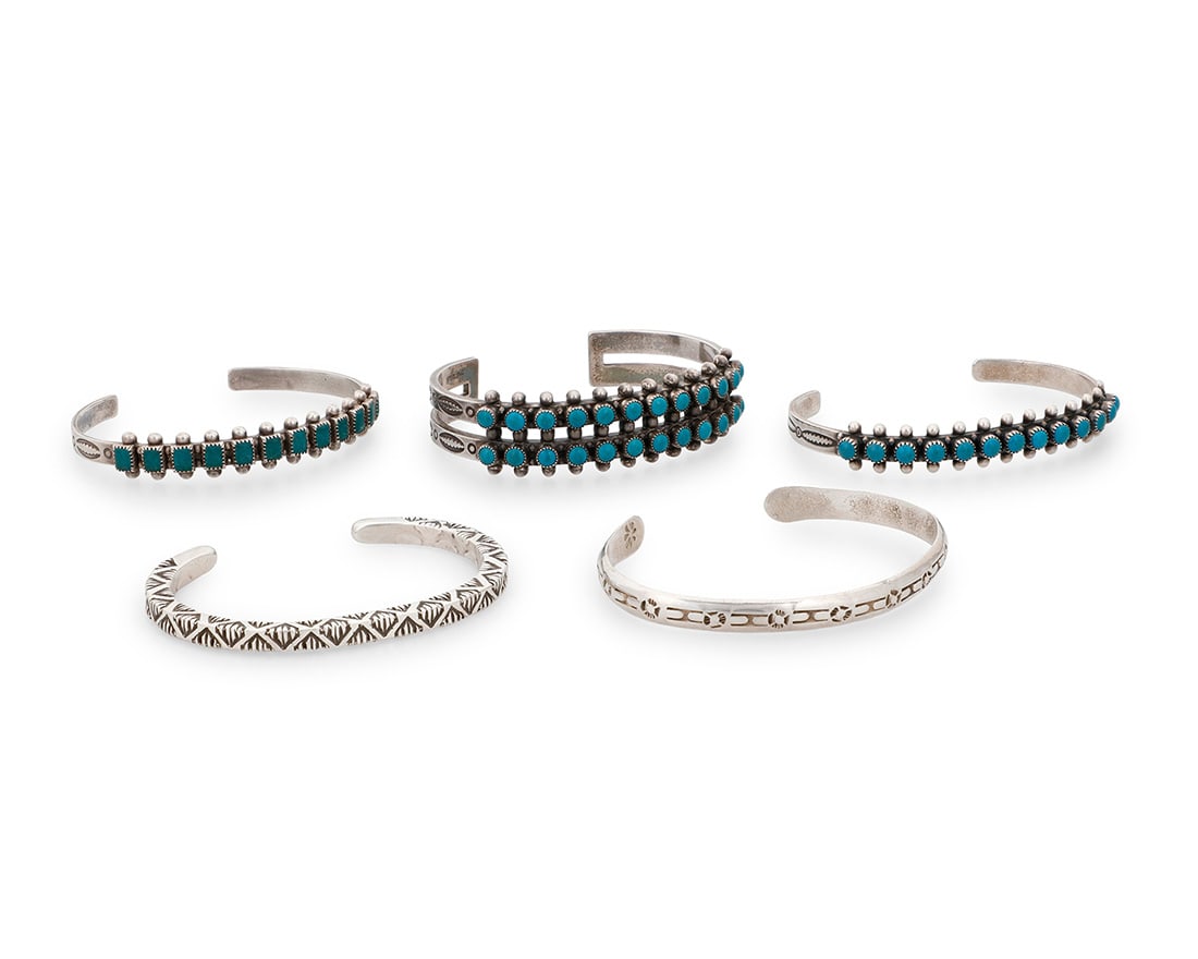 A group of Southwest silver and turquoise cuff bracelets Mid/late 20th century Four marked for (1 of 4)