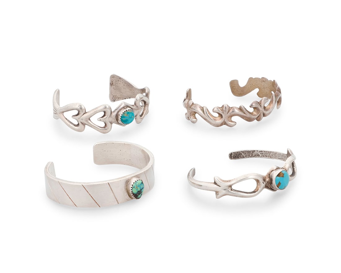 A group of Southwest style sterling silver cast silver cuff bracelets Mid/late 20th century One (1 of 3)