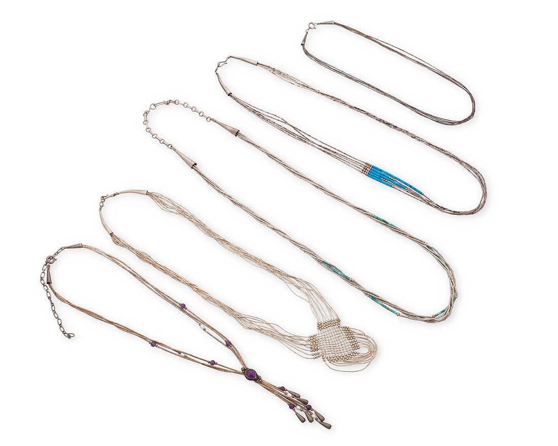 A group of Southwest style 'liquid silver' necklaces Late 20th century Unmarked Comprising five (1 of 2)