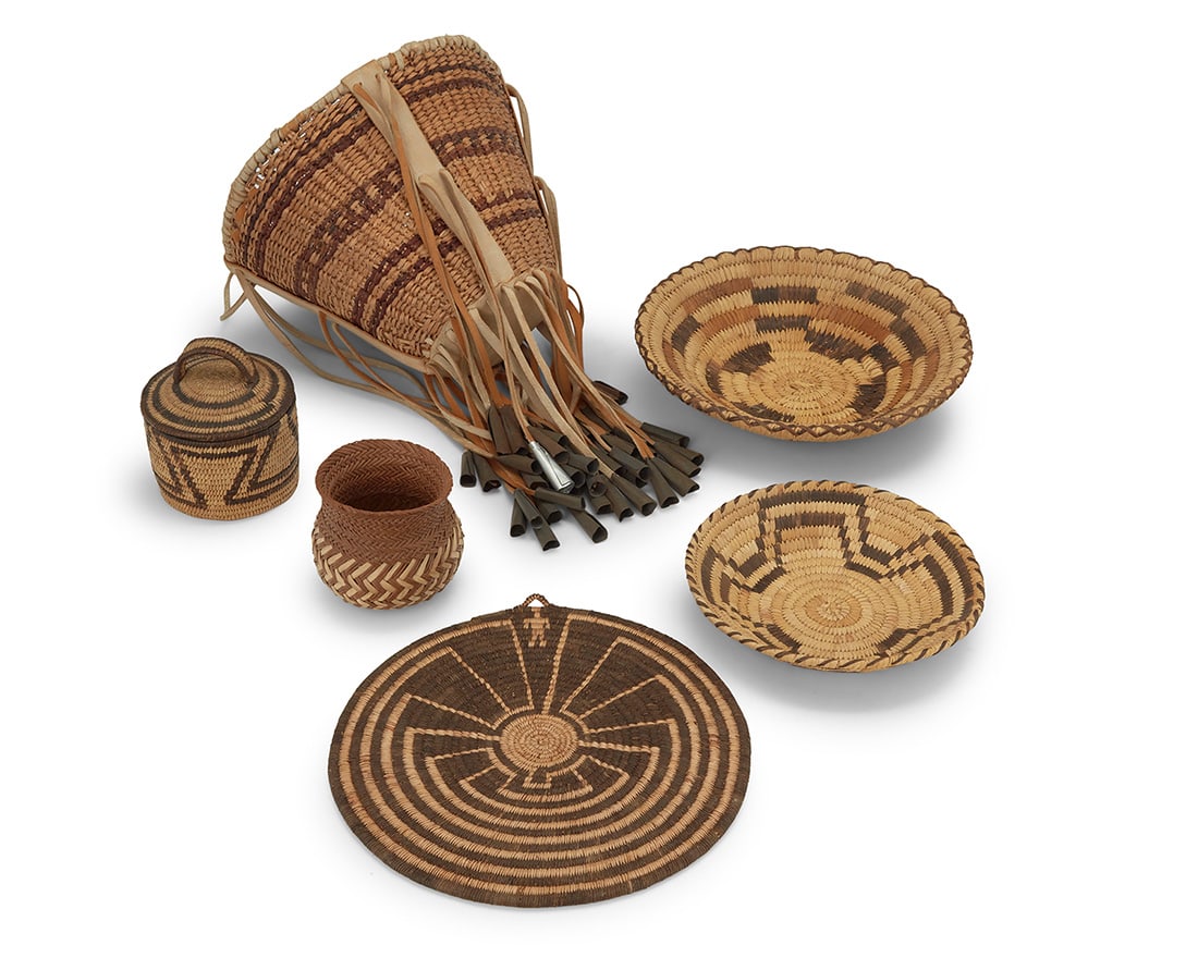 A group of Southwest baskets Mid-20th century Six baskets comprising an Apache-style twined burden (1 of 6)