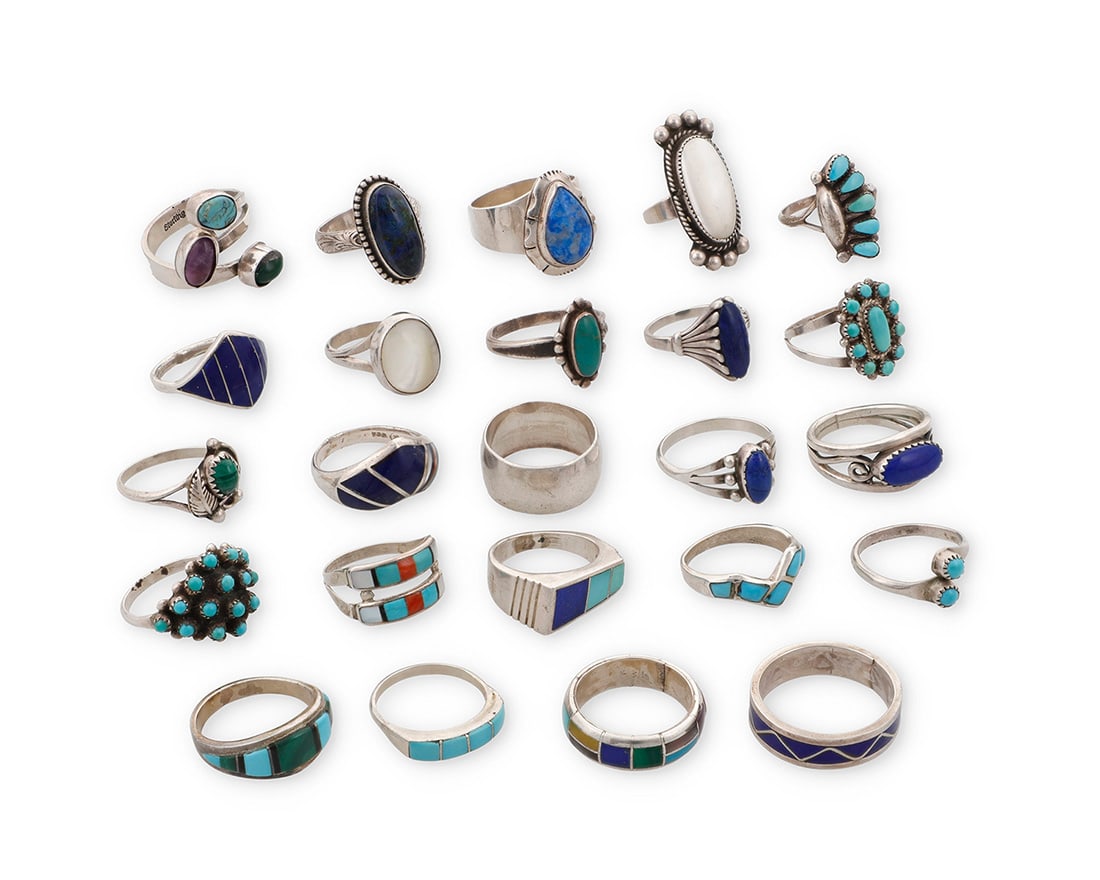 A group of Southwest-style silver and stone set rings: A group of Southwest-style silver and stone set rings Mid/late 20th century Nine variously marked for maker: KBM / TBA / [signpost pictograph] / DMD [conjoined, unknown] / LS / AL / MFC [conjoined,
