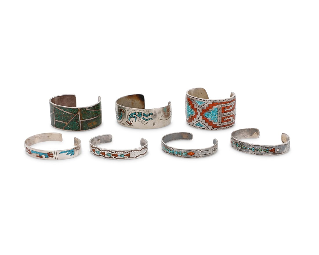 A group of Southwest silver and chip inlay cuff bracelets Mid/late 20th century Three variously (1 of 6)