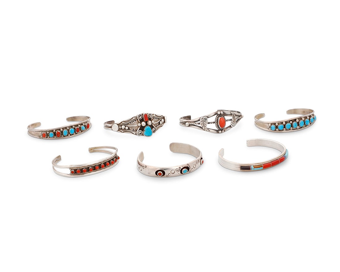 A group of Southwest style sterling silver cuff bracelets (1 of 5)