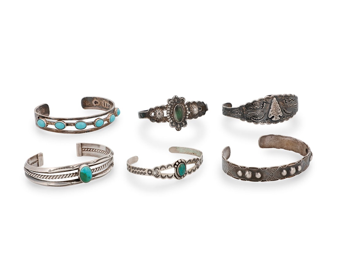 A group of Southwest style sterling silver and stone-set cuff bracelets Mid/late 20th century Four (1 of 3)