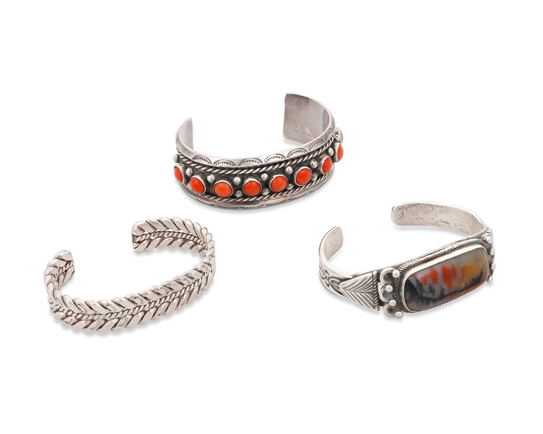Three Southwest style silver and set stone cuff bracelets Mid/late 20th century Each unmarked (1 of 2)