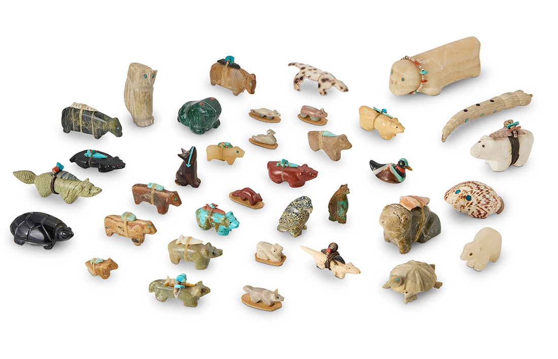 A large group of Southwest Pueblo carved stone fetish animals: A large group of Southwest Pueblo carved stone fetish animals Mid/late 20th century Unmarked Comprising multiple figures including bears, squirrels, lizards, turtles, frogs, badgers, foxes, ducks, an
