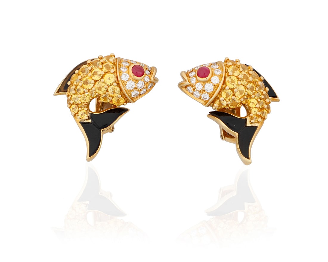 Jean Vitau: A Pair of 18K Gold, Gem-Set and Diamond Earclips: Jean Vitau: A Pair of 18K Gold, Gem-Set and Diamond EarclipsOf a fish design set with round sapphires, round ruby cabochons, carved onyx elements and round diamonds, signed Jean Vitau2 piecesMeasures: