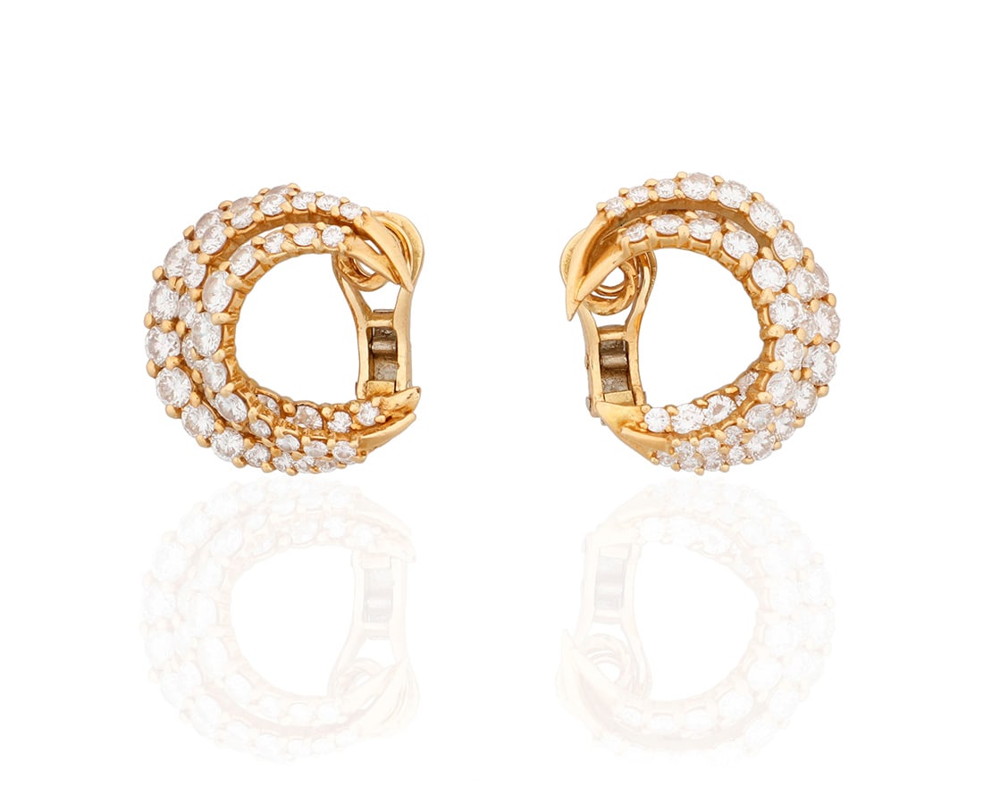 A Pair of 18K Gold and Diamond Earclips (1 of 3)