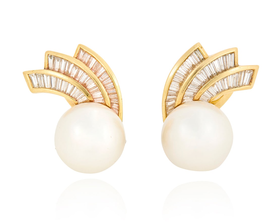 A Pair of 18K Gold, Cultured Pearl and Diamond Earclips: A Pair of 18K Gold, Cultured Pearl and Diamond EarclipsCentering two cultured pearls measuring 13.5 - 13.77 mm, accented by a spray of tapered baguette diamonds weighing approximately 1.92 carats tota