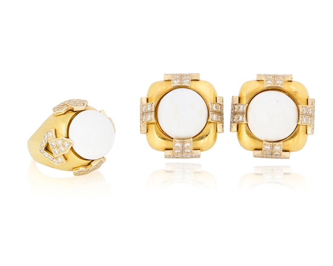 A Gold, Enamel and Diamond Ring and Earring Set: A Gold, Enamel and Diamond Ring and Earring SetFeaturing domes of white enamel set in a geometric design accented by round diamonds weighing approximately 2.60 carats3 piecesRing: 8, Earrings: 1 x 1 i