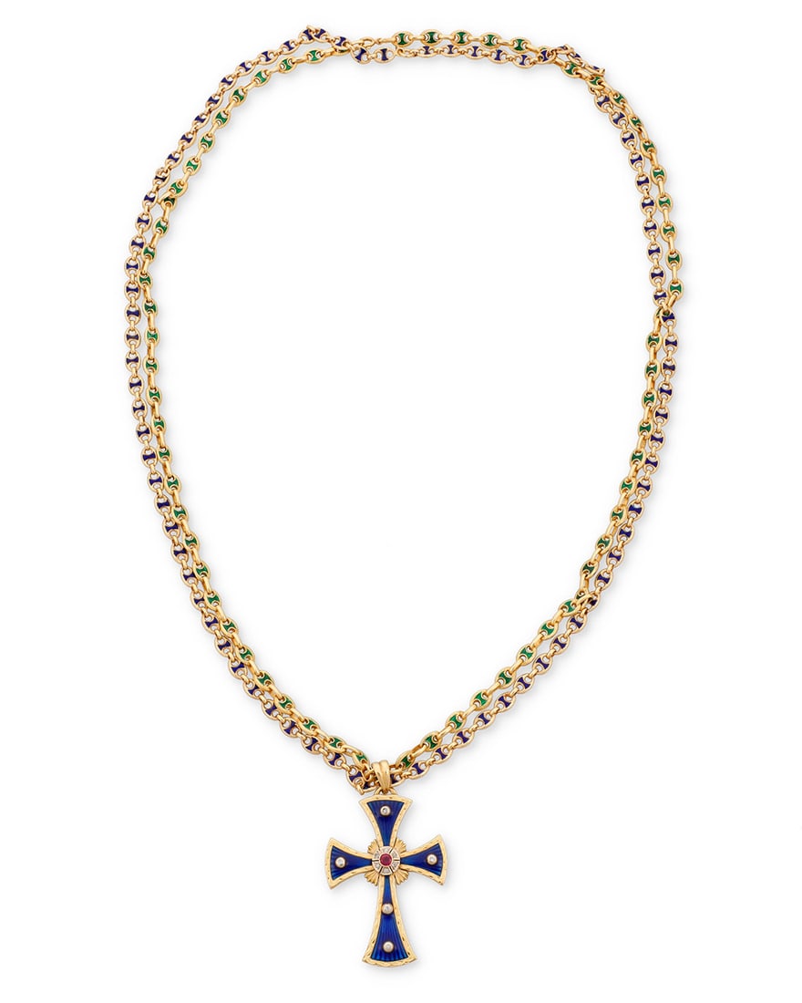 An 18K Gold, Enamel, Ruby and Diamond Cross Necklace: An 18K Gold, Enamel, Ruby and Diamond Cross NecklaceFeaturing a mariner-style double chain accented by green and blue enamel, suspending a blue enamel gold cross pendant set with a single round ruby a