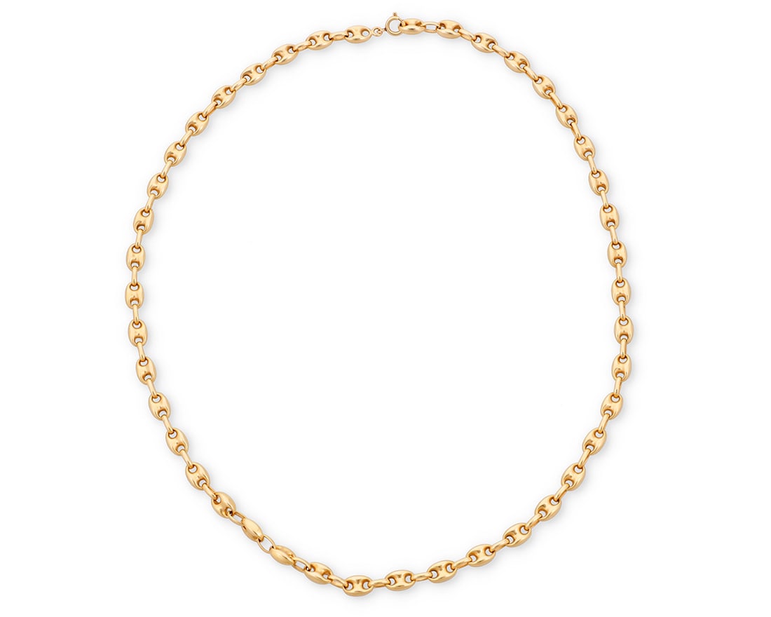 An 18K Gold Chain: An 18K Gold Chain Of a mariner link design Length: 24 1/4 in. 43.1 grams gross Provenance: The Estate of Joanna Carson