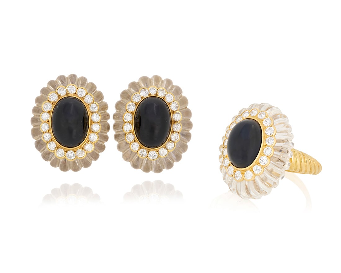 An 18K Gold, Onyx, Rock Crystal Quartz and Diamond Ring and Earring Set: An 18K Gold, Onyx, Rock Crystal Quartz and Diamond Ring and Earring Set Featuring carved fluted rock crystal quartz, centering oval onyx cabochons accented by round diamonds weighing approximately