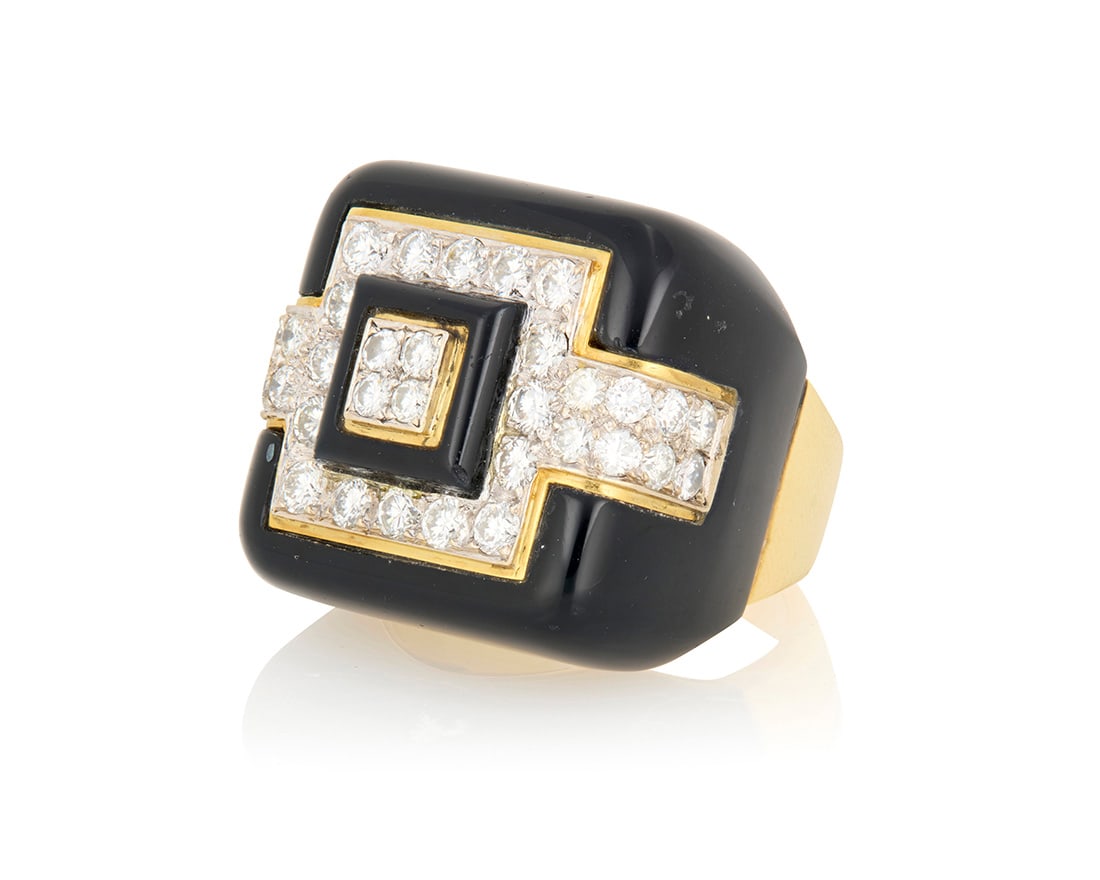 An 18K Gold, Onyx and Diamond Ring and Earring Set: An 18K Gold, Onyx and Diamond Ring and Earring SetOf a geometric design featuring panels of onyx, accented by round diamonds weighing 4.80 carats total3 piecesEarrings: 3/4 x 3/4 in., Ring: 848.1 gram
