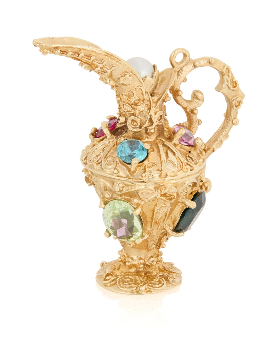 A 14K Gold and Gem-Set Charm: A 14K Gold and Gem-Set CharmOf an antique pitcher design featuring oval and round multi-colored synthetic stonesMeasures: 1 1/2 x 1 1/2 in.16.5 grams grossProvenance:The Estate of Joanna Carson