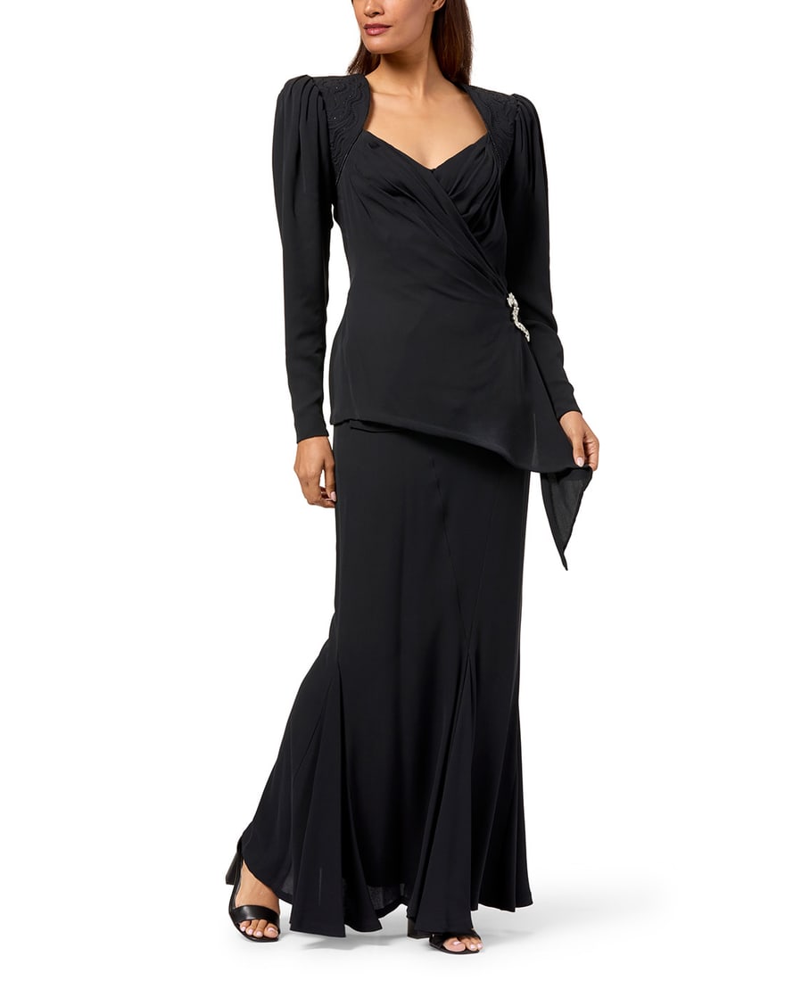 Emanuel Ungaro: A Black Silk Evening Skirt Ensemble: Emanuel Ungaro: A Black Silk Evening Skirt EnsembleCirca 1980s, FranceLabels: Emanuel Ungaro / Couture / ParisA two-piece black silk crepe skirt 'suit' featuring a long-sleeved front-wrap blouse with