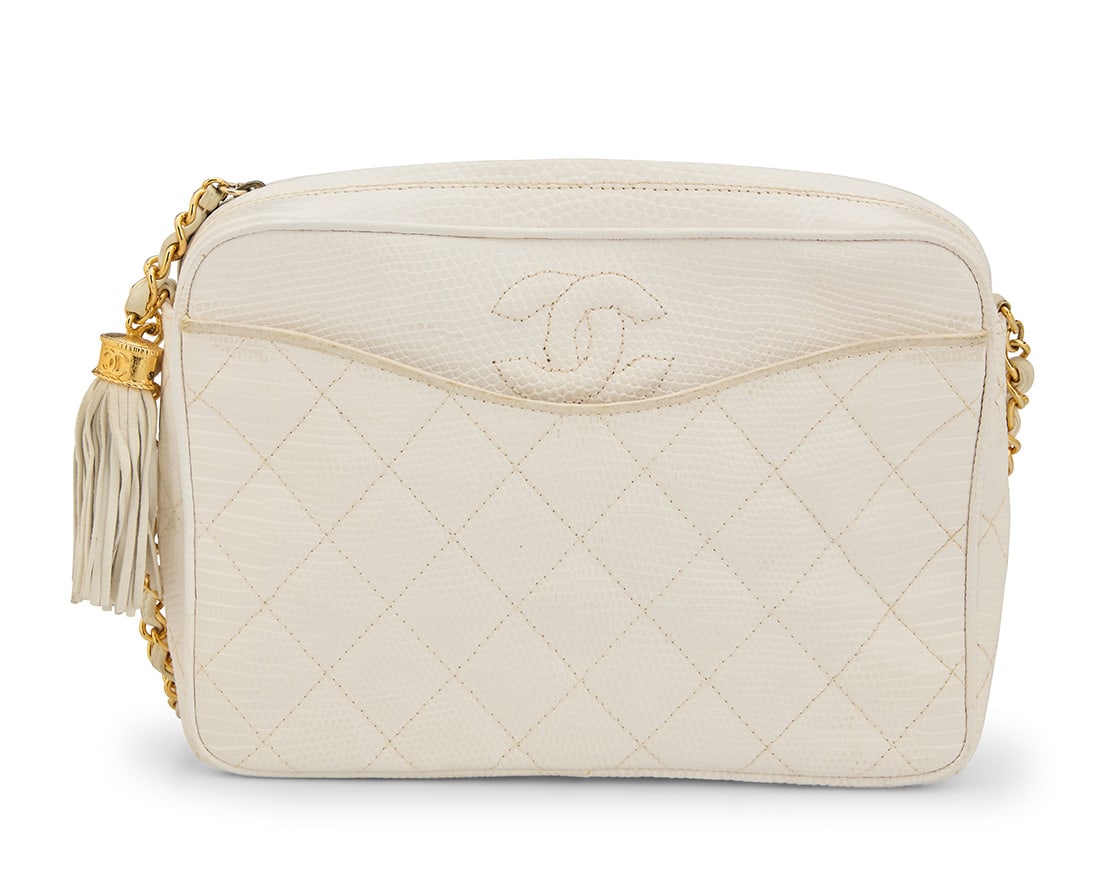 CHANEL: A Quilted White Lizard Leather CC Pocket Camera Bag: CHANEL: A Quilted White Lizard Leather CC Pocket Camera BagCirca 1980s; ItalyStamped to interior: Chanel / ® / Made in Italy; with early tag to pocket interior: 404680A vintage rectangular exotic lea