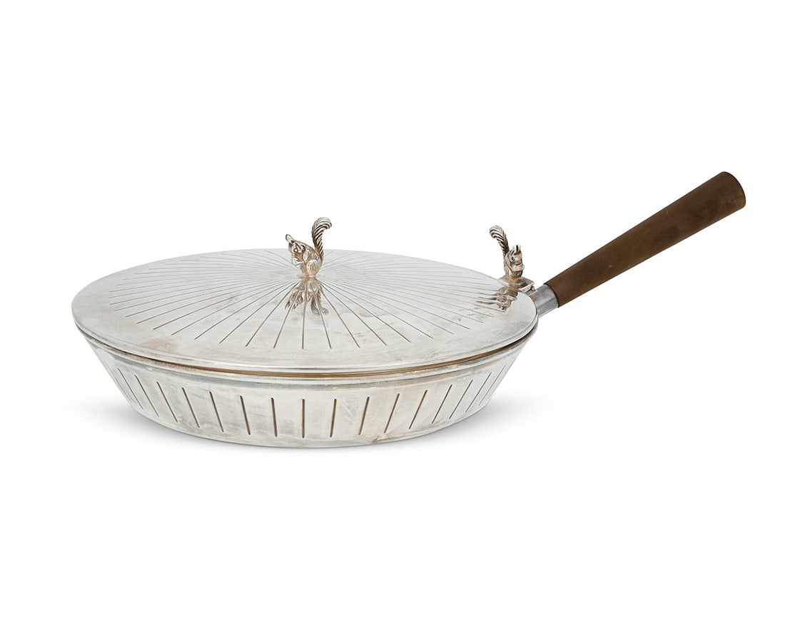 A Cartier sterling silver silent butler: A Cartier sterling silver silent butler20th centuryImpressed: CARTIER / STERLING / 925/000The circular dish with hinged lid surmounted by a squirrel finial and thumbpiece, with wood handle3.375" H x 1