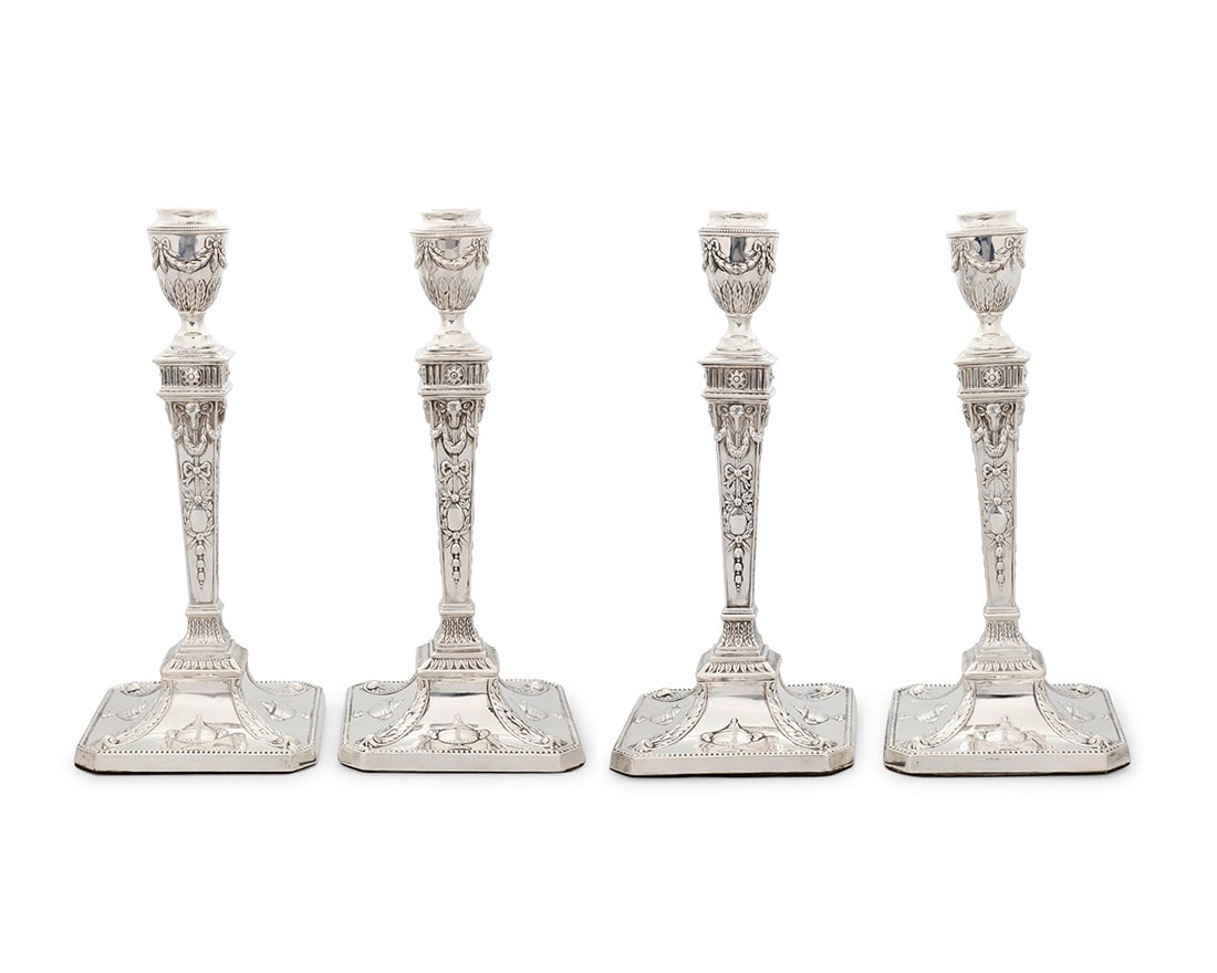 A set of four Neoclassical style weighted sterling silver candlesticks (1 of 6)