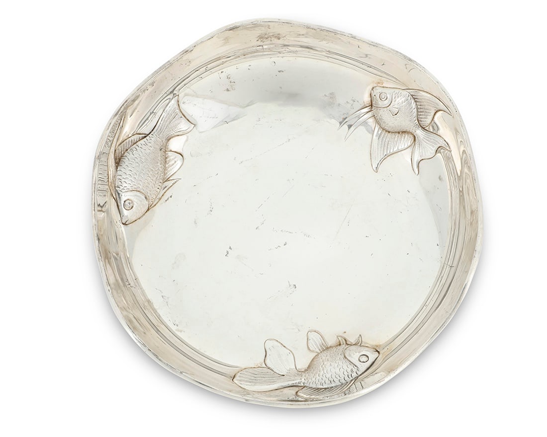 A Fratelli Cacchione for Cartier sterling silver bowl: A Fratelli Cacchione for Cartier sterling silver bowlPost-1968Impressed: ITALY / 925 [in an oval] / star 39 MI [in a polygon] / F.C. [in a circle] / STERLING / CartierWith undulating rim and three rep