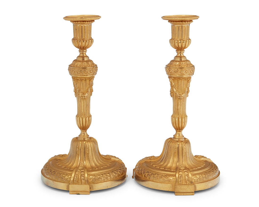 A pair of French gilt bronze candlesticks (1 of 4)