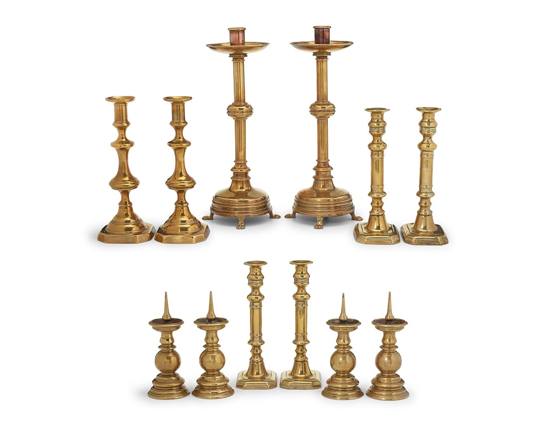 A group of brass candlesticks (1 of 3)