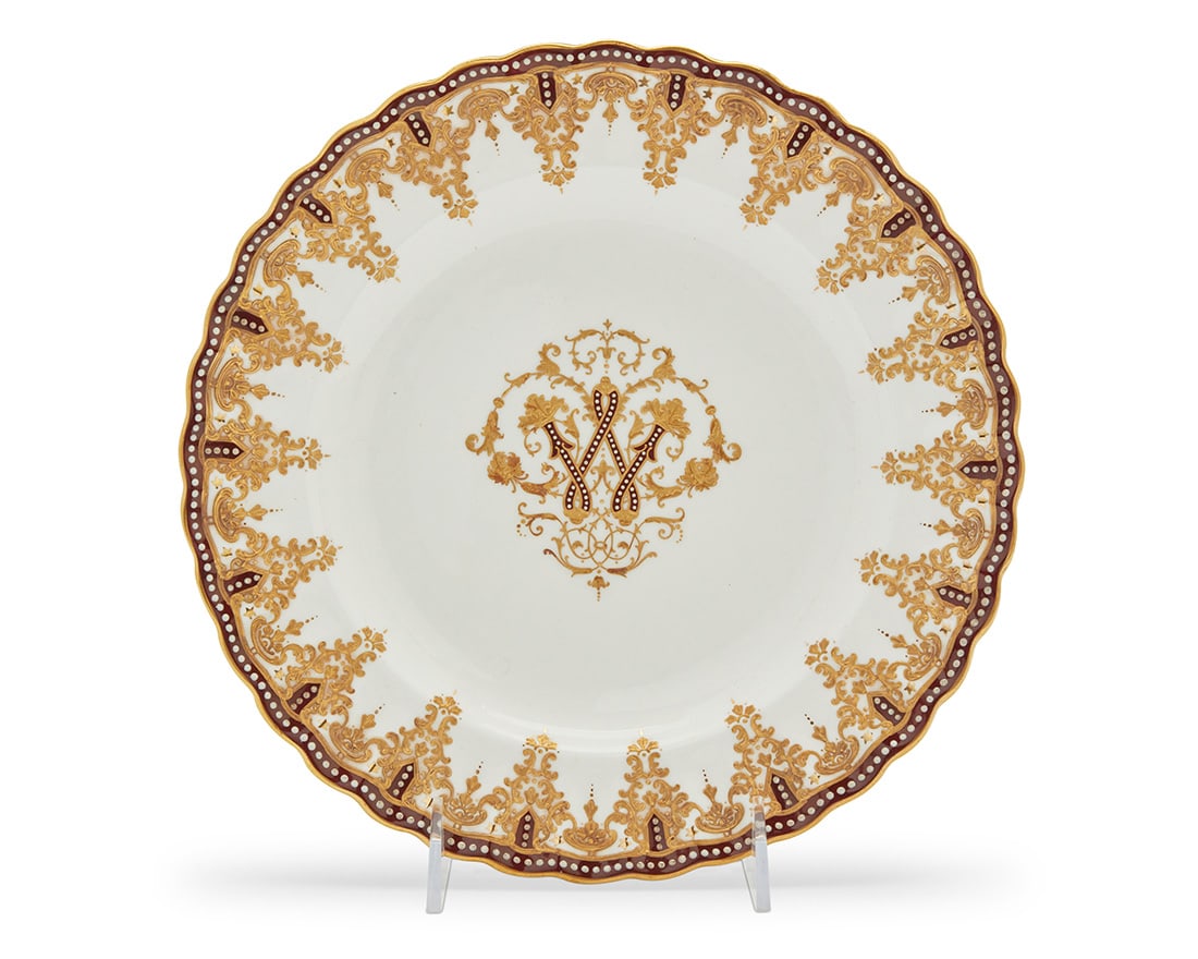 A set of eleven Copeland's for Tiffany & Co. porcelain plates: A set of eleven Copeland's for Tiffany & Co. porcelain platesLate 19th centuryEach stamped: Tiffany & Co. / New York; with blue underglaze stamp: Copeland's ChinaEach gilt and enameled, with central m