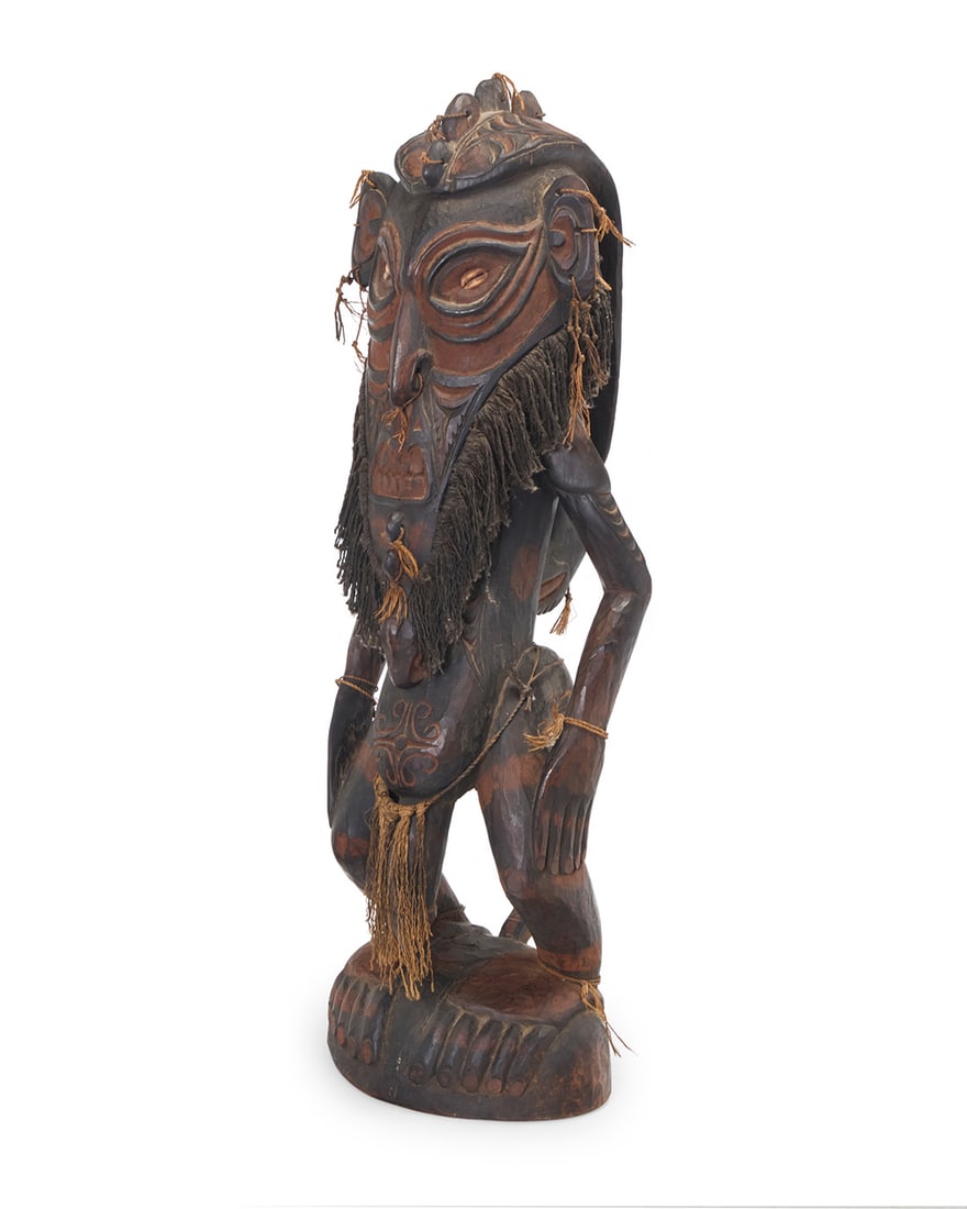 A Papuan carved wood ancestor figure (1 of 5)