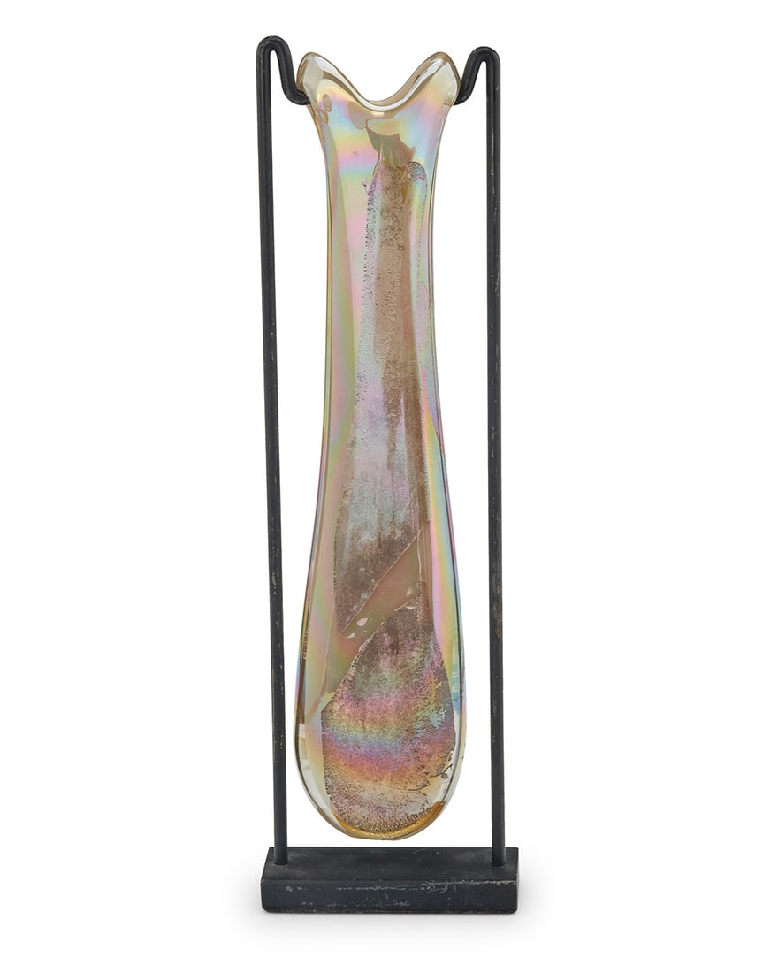 Homer James Yarrito (20th century), An art glass sculpture on a metal stand, 2000: Homer James Yarrito (20th century) An art glass sculpture on a metal stand, 2000 Etched signature and date: HJ YARRITO Cased iridescent glass Glass: 18" H; Overall: 19.5" H x 5.875" W x 2.125" D