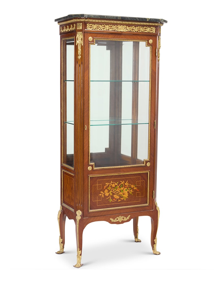 A Louis XVI style kingwood vitrine: A Louis XVI style kingwood vitrine Mid/late 20th century Surmounted by a marble top with glazed panel front and sides, the door with marquetry panel, with two glass shelves 63" H x 27.5" W x 15.5" D