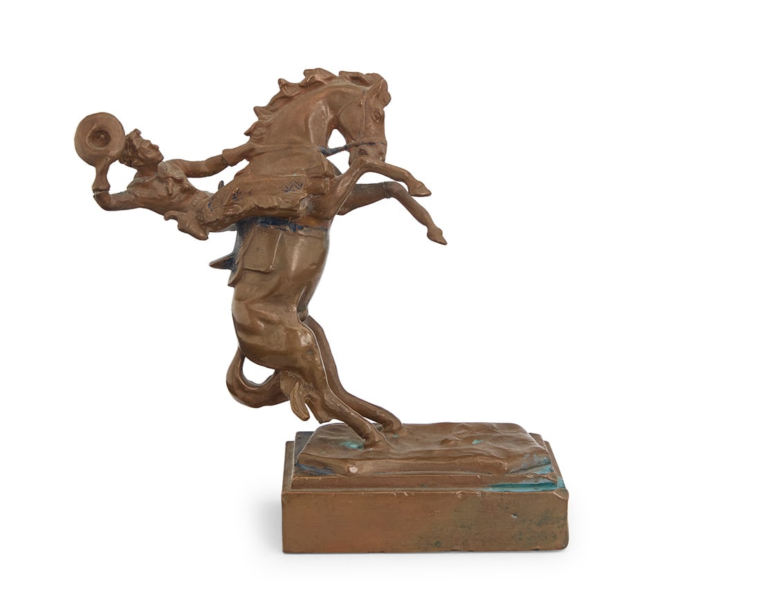 A Pompeian Bronze Works figure of a cowboy and bucking bronco (1 of 5)