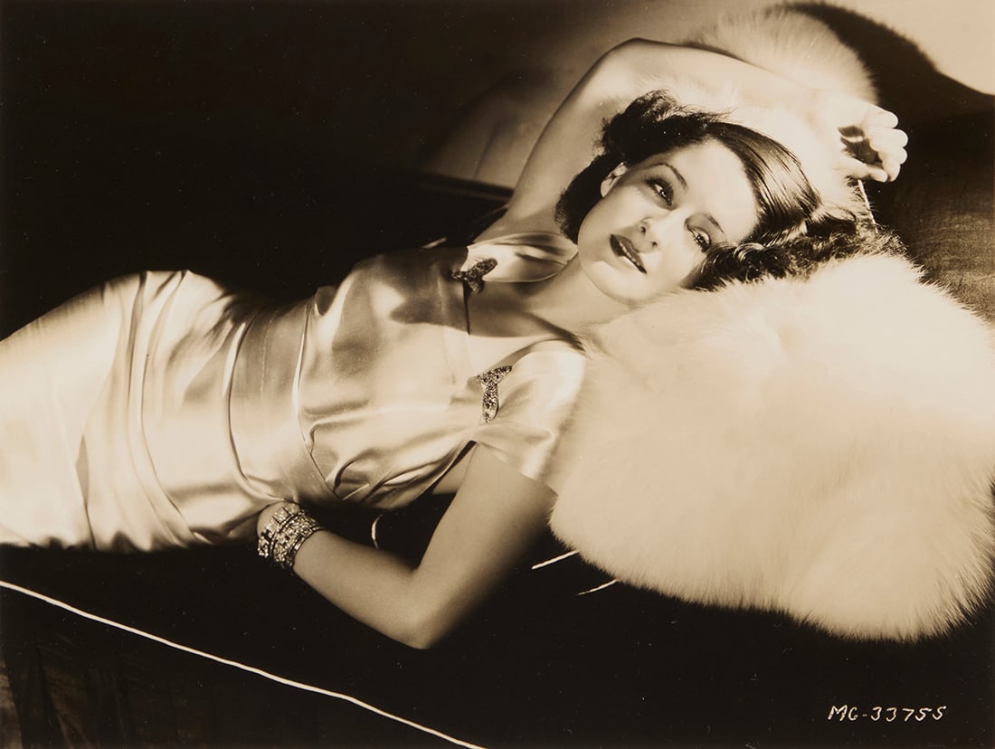 George Hurrell (1904-1992), A portrait of Norma Shearer: George Hurrell(1904-1992)A portrait of Norma ShearerPhotograph on paperFrom the edition of unknown size and dateAppears unsigned; inscribed in the negative lower right: MC-33755Image: 7.5" H x 9.5" W