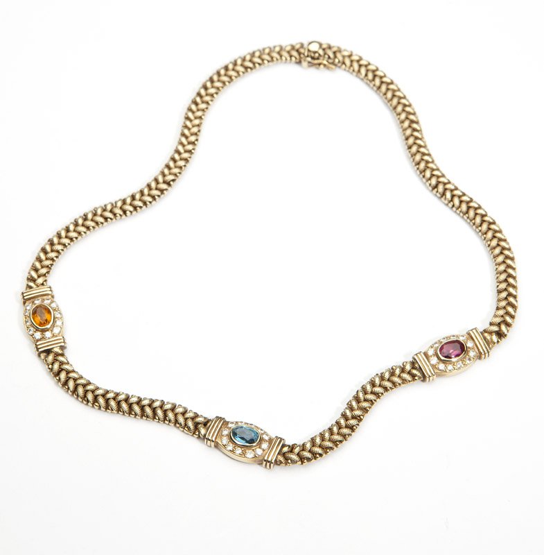 A gem-set and gold fancy link necklace: 14K gold with gem-set and diamond accent sectionals, 15'', 35.5 gms gross, est: $800/1200