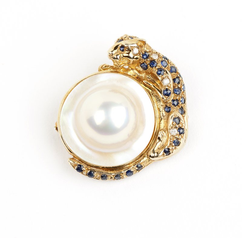 A mabe, gem-set and gold panther pendant-brooch