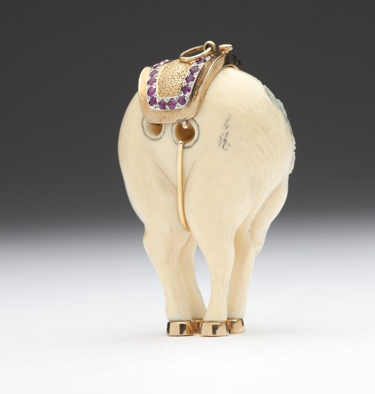 A gem-set and gold horse pendant - 2