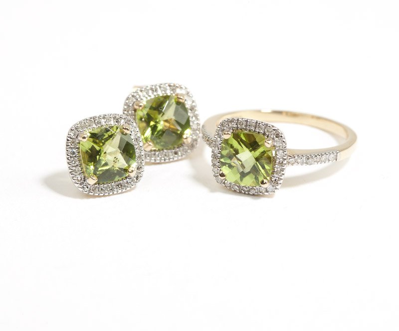 A set of peridot, diamond and gold jewelry