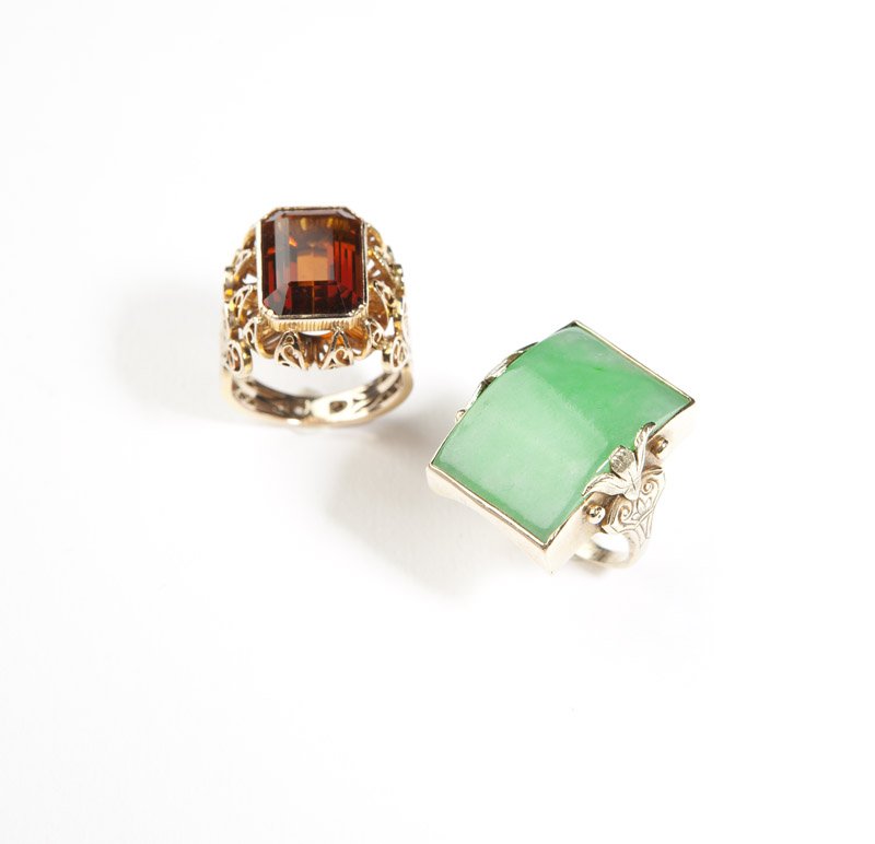A jade and gold ring and a citrine and gold ring