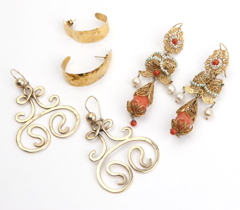 A collection of 14K gold earrings