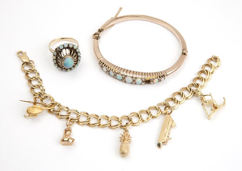 A group of stone and gold items