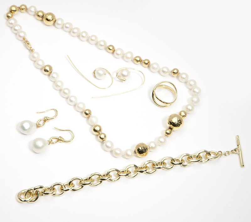 A group of pearl and gold jewelry, Ippolita: Signed Ippolita, comprising a cultured pearl and 18K gold bead necklace, an 18K gold chain toggle bracelet, two pair of cultured pearl earrings and one "X" ring; one pair of the earrings and ring not 