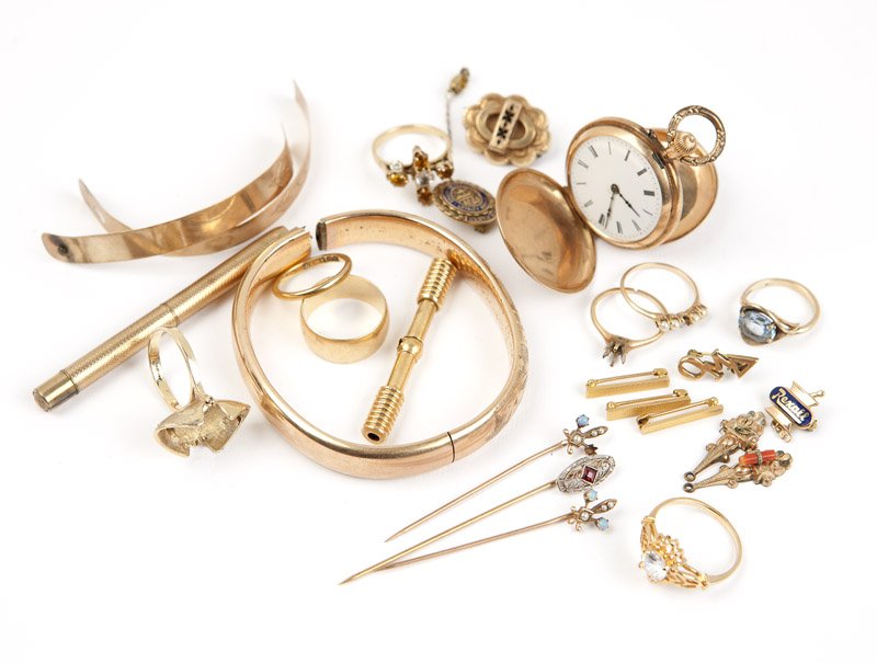 A collection of gold jewelry items