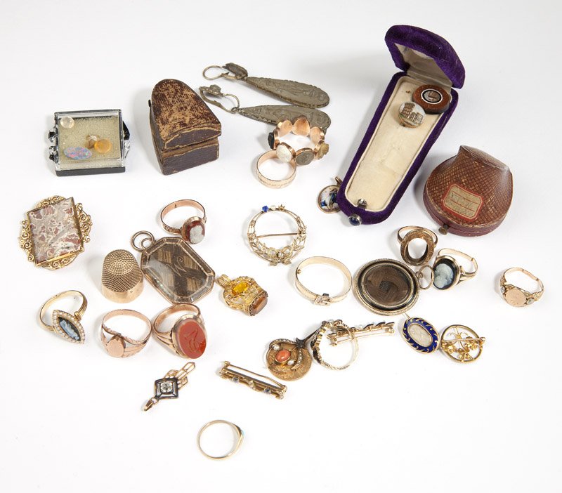 A collection of gold and gold filled jewelry